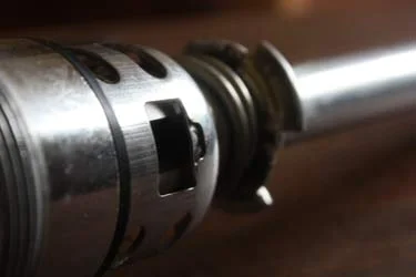 Parts of a European sanke keg valve, photographed close up