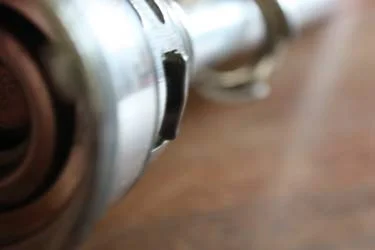 Parts of a European sanke keg valve, photographed close up